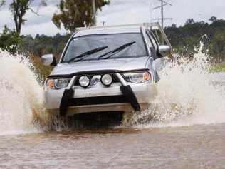 If it is flooded, forget it. No matter how big your four-wheel-drive is. And slow down! Picture: David Nielsen