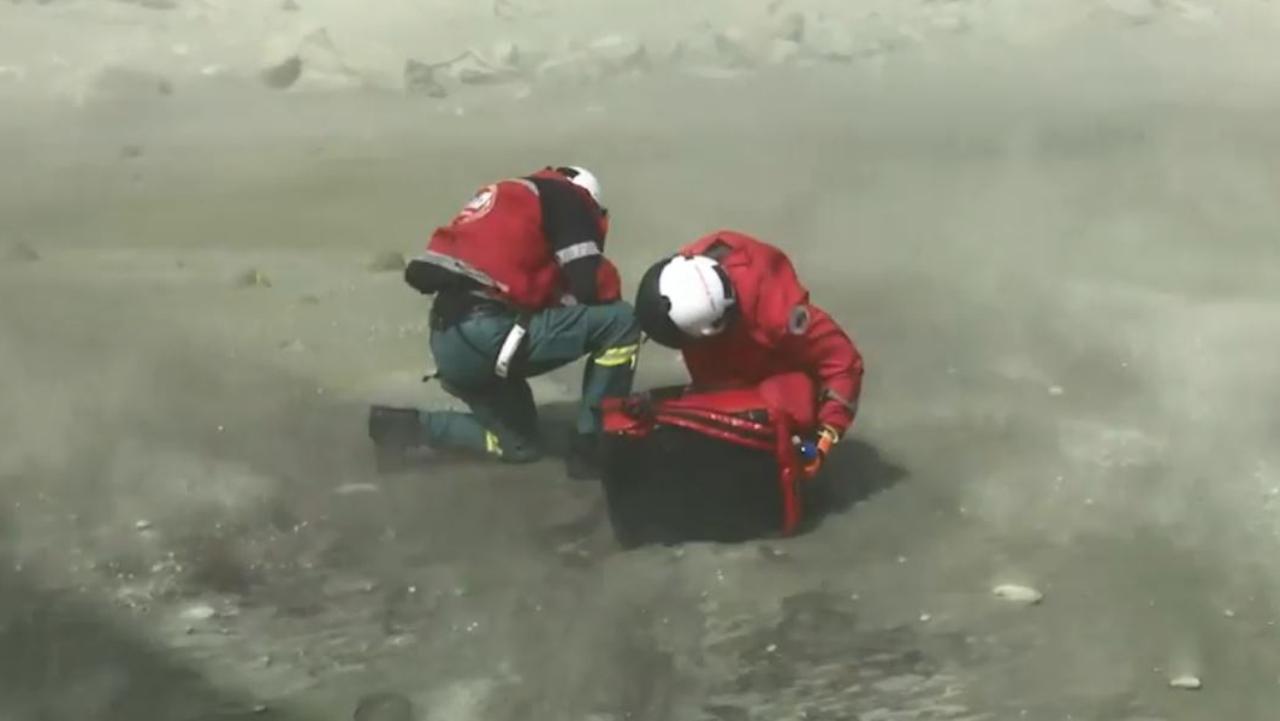 Rescuers arrive on White Island after the volcano eruption. Picture: Auckland Rescue Helicopter Trust