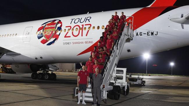 Arsenal prepare to board a flight.