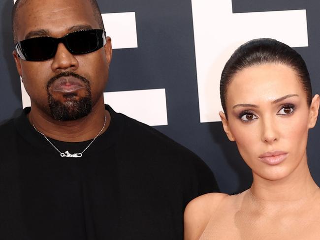 PIXELATED VERSIONS -  LOS ANGELES, CALIFORNIA - FEBRUARY 02: (EDITOR'S NOTE: Image contains nudity.) L-R, Kanye West and Bianca Censori attend the 67th Annual GRAMMY Awards on February 02, 2025 in Los Angeles, California.  (Photo by Matt Winkelmeyer/Getty Images for The Recording Academy)