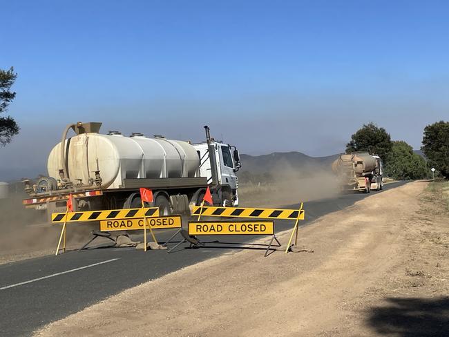 Tankers drive towards the fire zone. Picture: Supplied