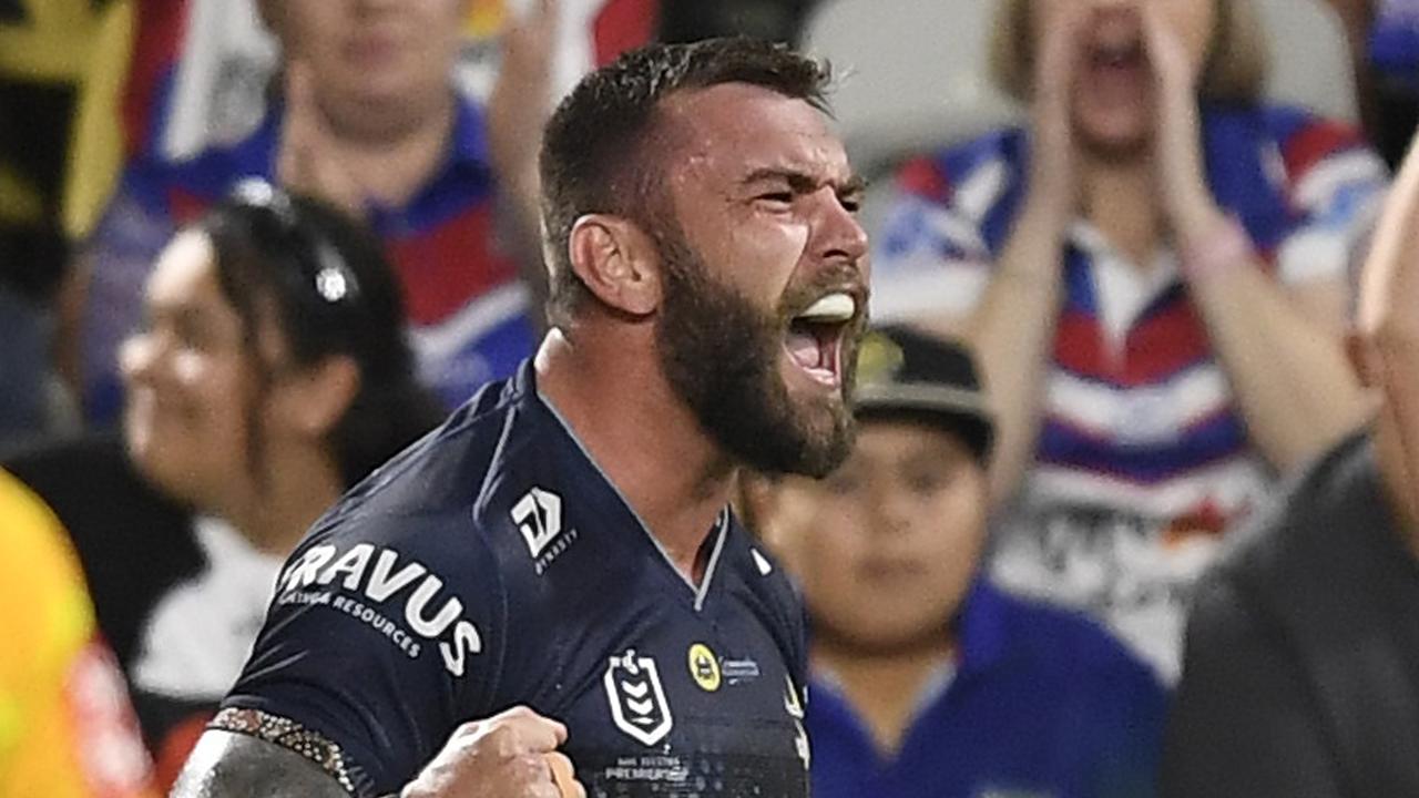 TOWNSVILLE, AUSTRALIA - MAY 28:  Kyle Feldt of the Cowboys celebrates after scoring a try   during the round 12 NRL match between the North Queensland Cowboys and the New Zealand Warriors at QCB Stadium, on May 28, 2021, in Townsville, Australia. (Photo by Ian Hitchcock/Getty Images)