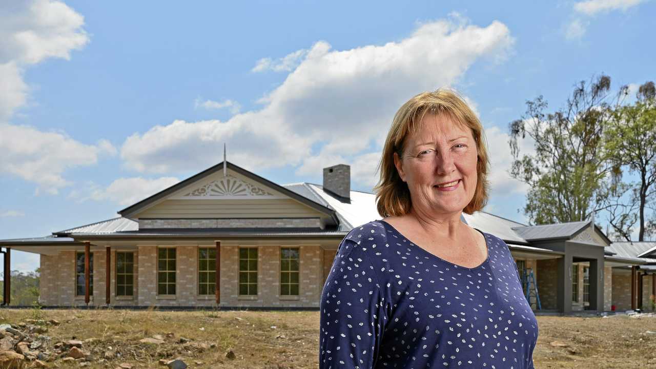 ON TRACK: Peggy Hockey is just a couple of weeks away from moving into her new home in Mount Alford, which ground to a halt after the collapse of G.J Gardner's North Ipswich franchise in January. She is still out of pocket about $100,000. Picture: Cordell Richardson