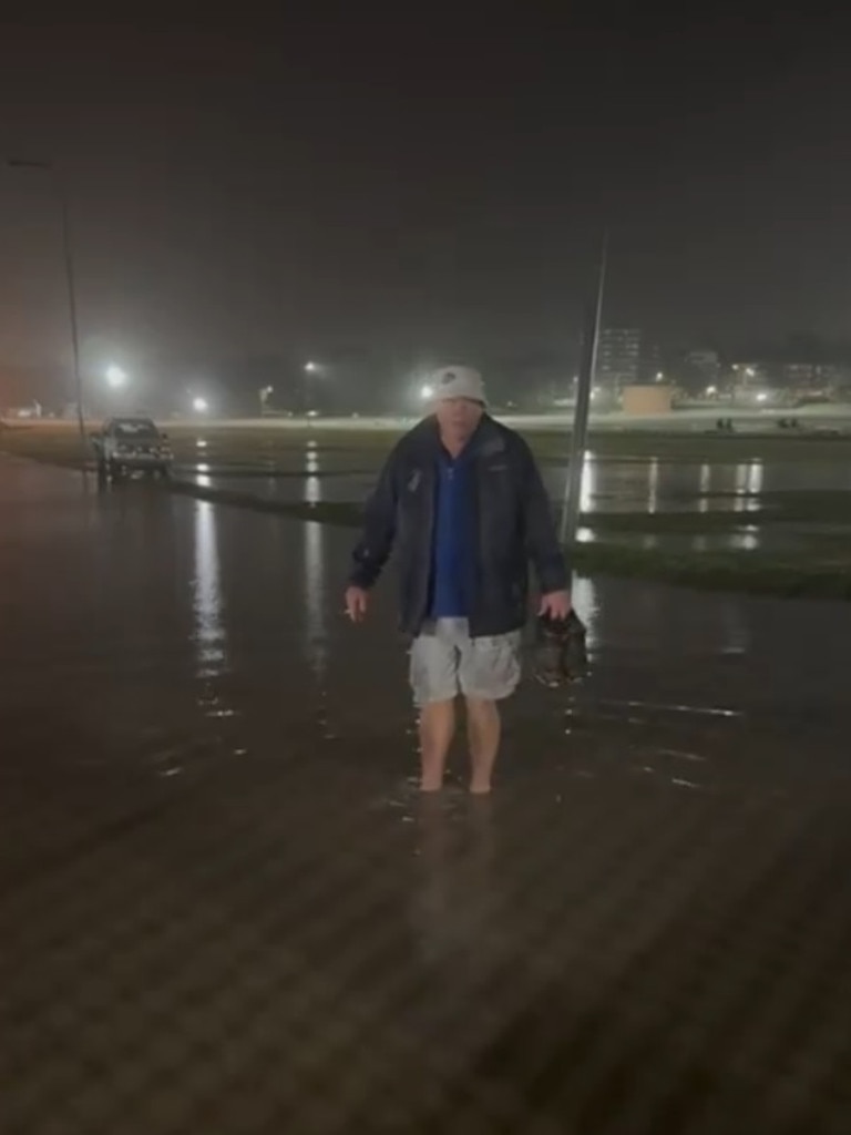 Peter Moody standing in the water