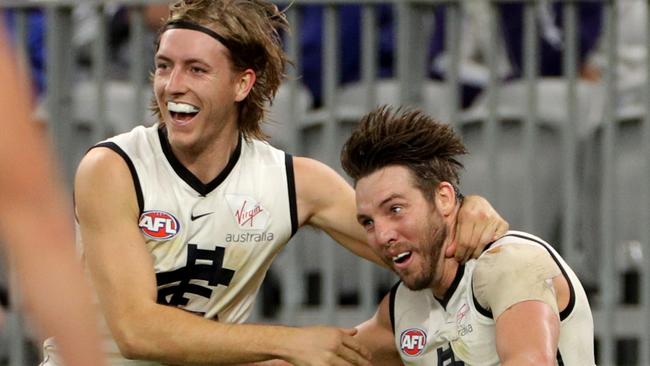 Dale Thomas celebrates with Will Setterfield after putting the Blues in front late in the match. Picture: AAP