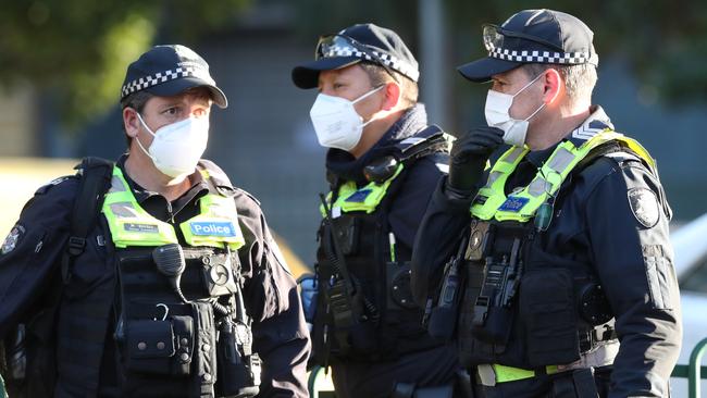 MELBOURNE, AUSTRALIA - NewsWire Photos JULY 05, 2020: Police on the scene at Government Housing towers on Racecourse road in Flemington which have been locked down by the Victorian Government in an attempt to stop the outbreak of COVID-19. Picture: David Crosling