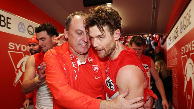 Swans head coach John Longmire celebrates with Dane Rampe (Photo by Mark Metcalfe/AFL Photos/via Getty Images)