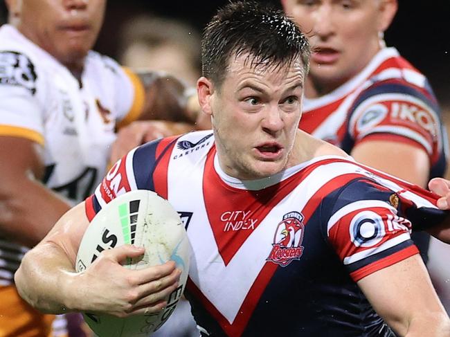 SYDNEY, AUSTRALIA - AUGUST 04: Luke Keary of the Roosters is tackled during the round 21 NRL match between the Sydney Roosters and the Brisbane Broncos at the Sydney Cricket Ground on August 04, 2022, in Sydney, Australia. (Photo by Cameron Spencer/Getty Images)