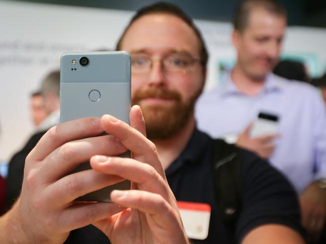 A member of the media holds up Google’s latest smartphone. Picture: Elijah Nouvelage