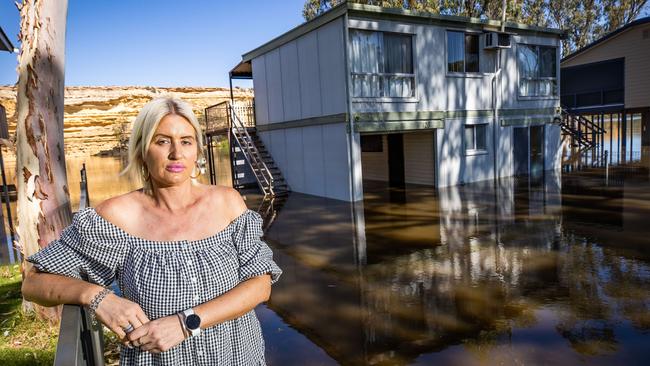 Sara Adams at her flooded shack at Blanchetown. Picture: Tom Huntley