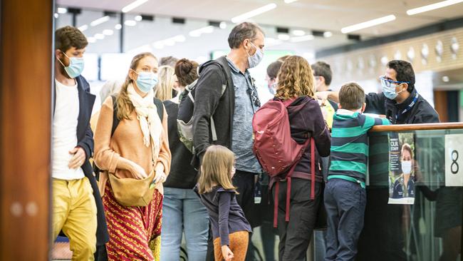 Arrivals into Hobart Airport going through Covid screening procedures with Biosecurity Tasmania. Picture: MATHEW FARRELL