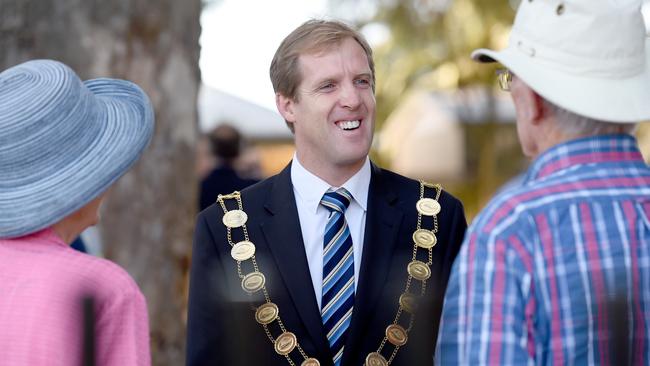 Glenelg Mayor Stephen Patterson talks to a couple attending the Proclamation Day ceremony at The Old Gum Tree in Glenelg. Picture:Naomi Jellicoe