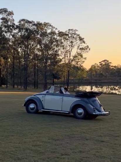 Ms Edsell arrived in a 1952 convertible beetle.