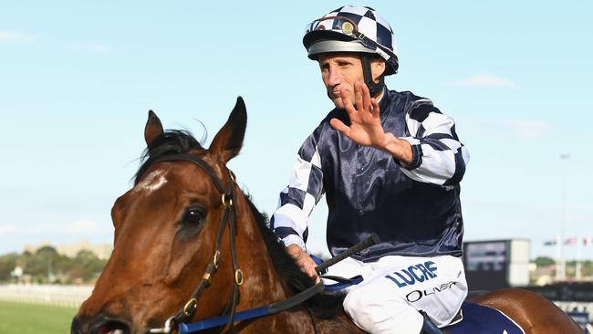 Damien Oliver rode the winner in the final race of the carnival, piloting Order of Command home at Flemington. Pic: Getty Images