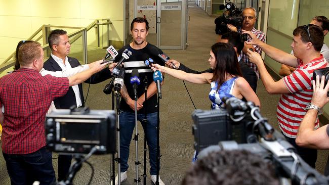 Sydney Roosters star Mitchell Pearce talks to media at Sydney Airport on Sunday. Picture: Gregg Porteous