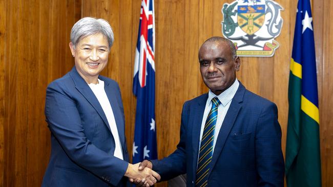 Foreign Affairs Minister Penny Wong is welcomed to Honiara by Solomon Islands Jeremiah Manele. Picture: AFP