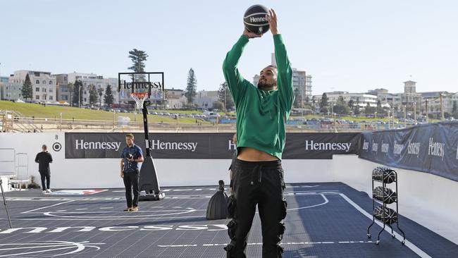 Nick Kyrgios takes part in the Hennessy basketball event in an empty Bondi Icebergs ocean pool. Picture: Toby Zerna