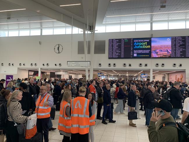 Huge wait times at the Adelaide Airport after everyone need to be re-screened . Picture: Tara Miko