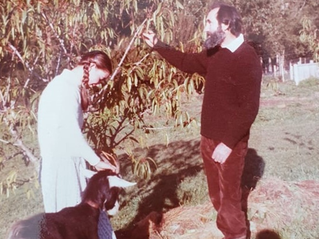 Geoff Rallings with his daughter Irene and their pet goat that followed them everywhere. Picture supplied by Irene Rallings