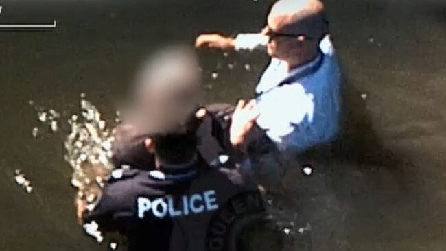 Police officers retrieve Keiran Patrick John Gray from the Nerang River. Picture: Queensland Police Service