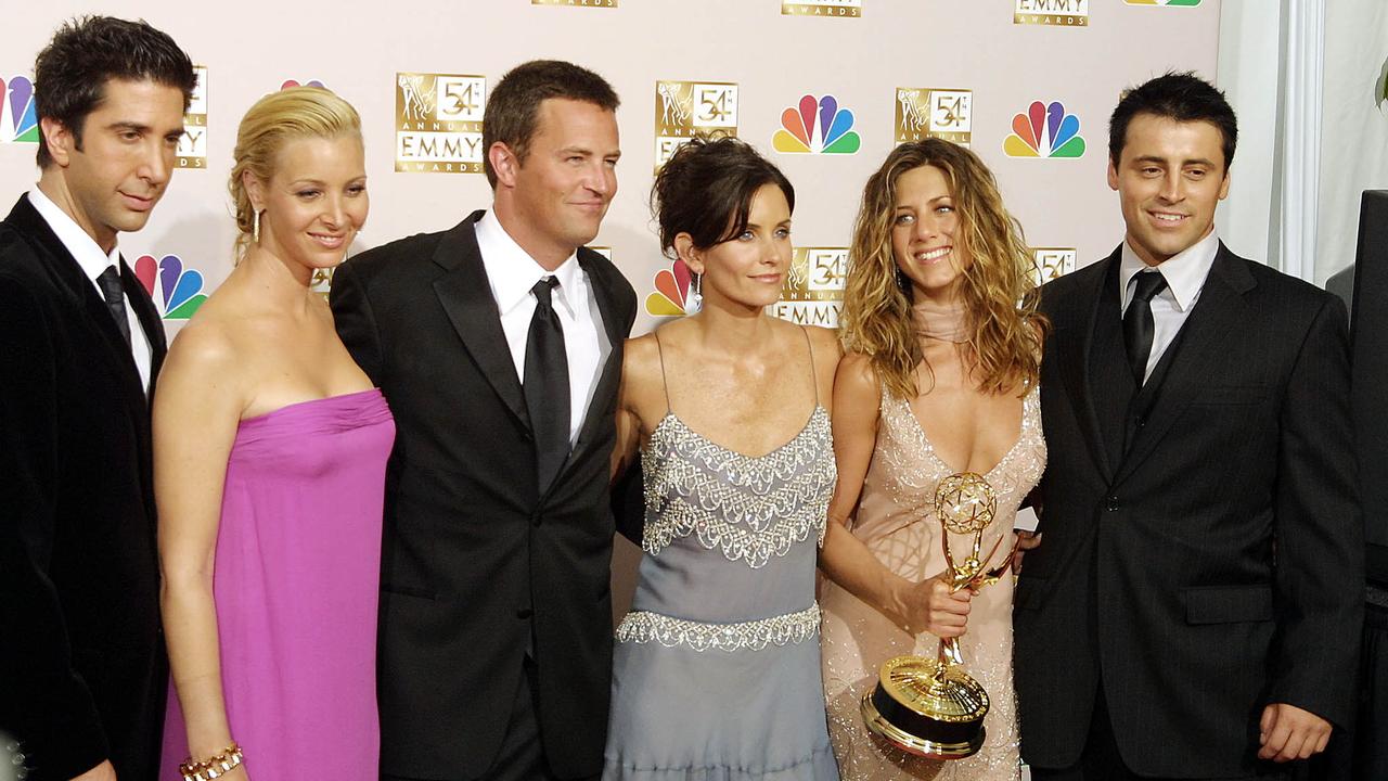 David Schwimmer, Lisa Kudrow, Mathew Perry, Courteney Cox Arquette, Jennifer Aniston, and Matt Leblanc, pose for photographers at the 54th Annual Emmy Awards at the Shrine Auditorium in Los Angeles. (Photo by LEE CELANO / AFP)