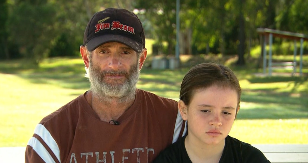 Craig and his young daughter Kira managed to survive two harrowing nights clinging to a tree, surrounded by deep flood water at Gympie. Picture supplied.