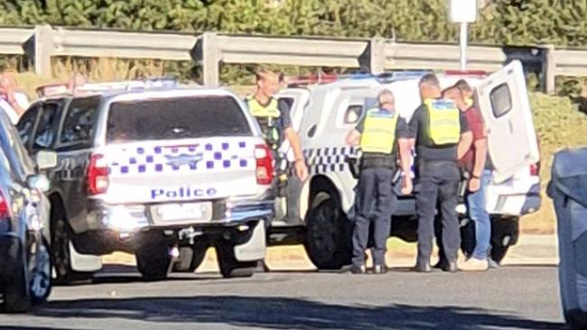 Police make an arrest in Rippleside on Monday morning. Photo: Facebook.