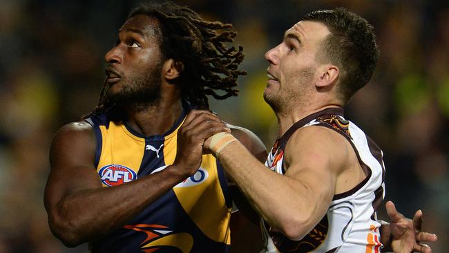 Nic Naitanui competes with Hawthorn’s Jonathon Ceglar.