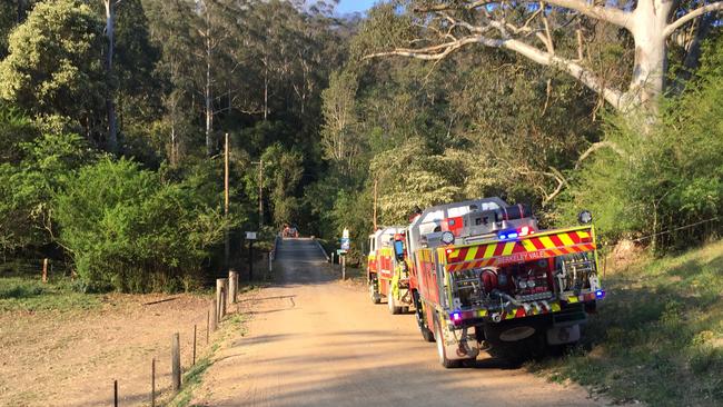 RFS crews at the Palm Grove property. Picture: Richard Noone/NewsLocal