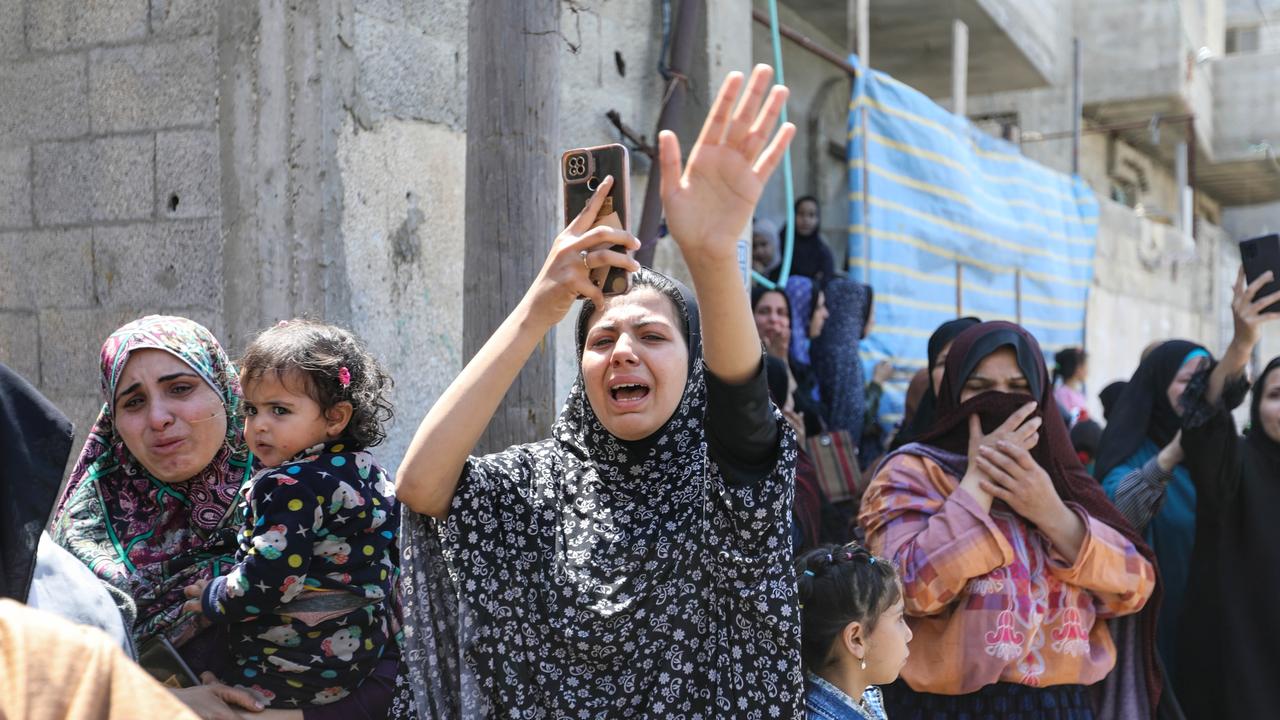 People mourn after an Israeli strike on April 11, 2024 in Rafah, Gaza. Picture: Ahmad Hasaballah/Getty Images