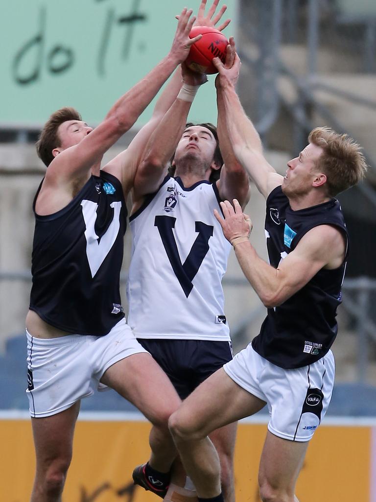 Vic Country’s Lachlan Smith and VAFA’s Harry Thompson and Timothy Harper at Ikon Park, Carlton. Picture: Yuri Kouzmin