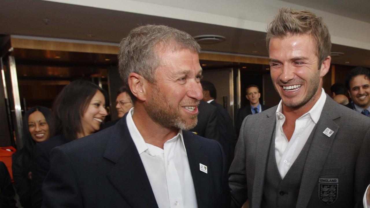 Russian billionaire oligarch and Chelsea owner Roman Abramovich speaking to David Beckham.