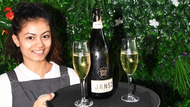 Monsoons staff member Jenika Acharya celebrates after a big weekend after the stage Three Covid-19 restrictions were lifted. Picture: Katrina Bridgeford