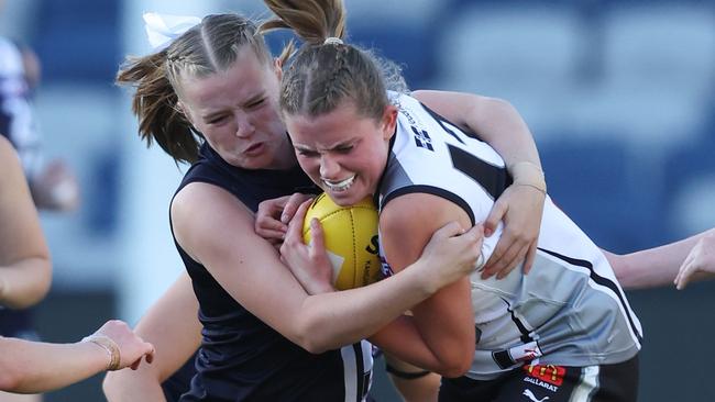 GEELONG, AUSTRALIA - MARCH 28: Meg Alsop of the Falcons and Tansy Seymour of the Rebels compete for the ball during the 2024 Coates Talent League Girls Round 1 match between the Geelong Falcons and GWV Rebels at GMHBA Stadium on March 28, 2024 in Geelong, Australia. (Photo by Rob Lawson/AFL Photos)