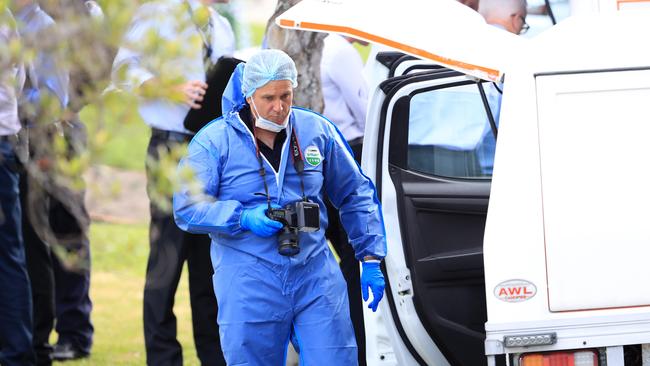 Forensic police following the nightmare discovery of Mr Beever’s body at a Varsity Lakes home on Thursday. Picture: Adam Head.