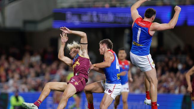Kai Lohmann of the Lions and Steven May of the Demons collide. (Photo by Russell Freeman/AFL Photos via Getty Images)