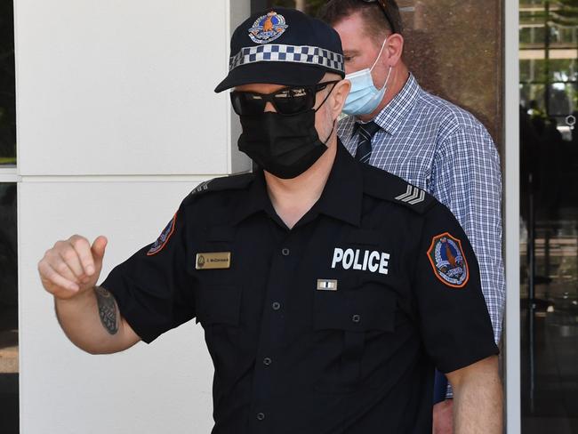 Senior Constable Shane McCormack leaves the NT Supreme Court after giving evidence on Monday. Picture: (A)manda Parkinson