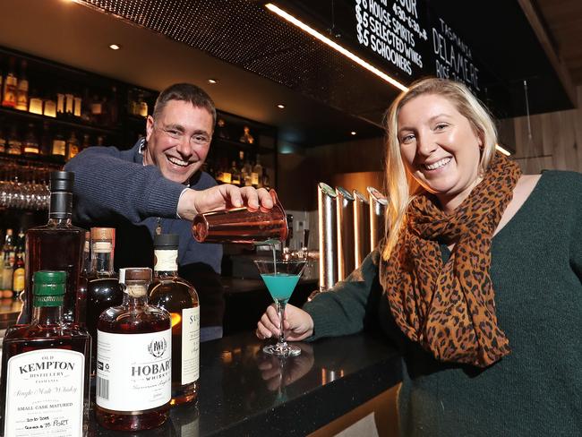 Destination Southern Tasmania's Alex Heroys (left) with Emma Gilligan from the Tasmanian Whisky and Spirits Association at the launch of Tasmanian Whisky Week. Picture: LUKE BOWDEN