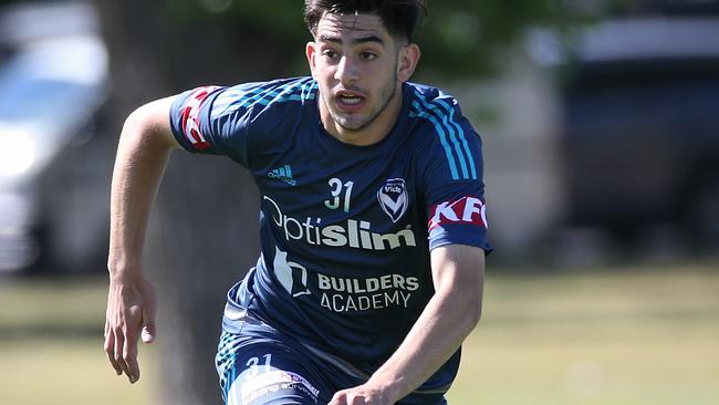 Melbourne Victory coach Kevin Muscat has challenged teen sensation Christian Theoharous to put pressure on starting side with performances off the bench.