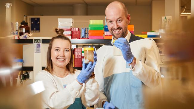 Patient Stephanee Hermsen with Dr Sam Costello in the Biomebank lab at the The Hospital Research Foundation in Woodville South. Picture: AAP / Matt Loxton