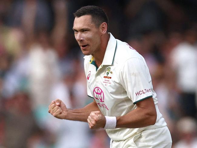 TOPSHOT - Indiaâs Nitish Kumar Reddy (L) reacts after being dismissed by Australiaâs Scott Boland on day two of the fifth cricket Test match between Australia and India at The SCG in Sydney on January 4, 2025. (Photo by DAVID GRAY / AFP) / -- IMAGE RESTRICTED TO EDITORIAL USE - STRICTLY NO COMMERCIAL USE --