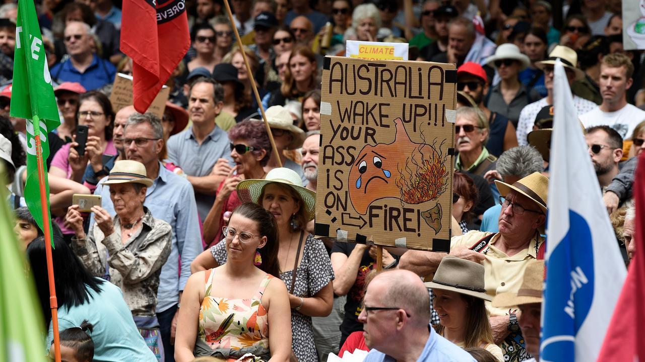 Protesters hold placards during the Climate Crisis National Day of Action rally in Sydney on February 22 last year. Picture: Bianca De Marchi/AAP