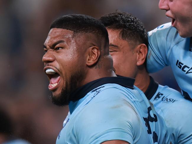 SYDNEY, AUSTRALIA - FEBRUARY 14: Siosifa Amone of the Waratahs celebrates the match winning try during the round one Super Rugby Pacific match between NSW Waratahs and Highlanders at Allianz Stadium, on February 14, 2025, in Sydney, Australia. (Photo by Darrian Traynor/Getty Images)