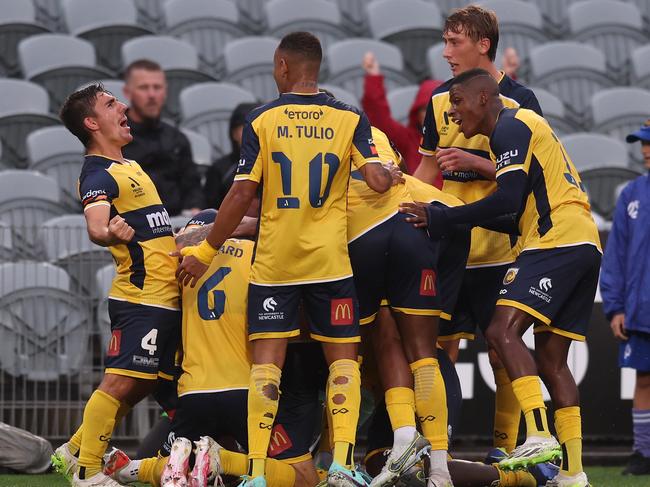 GOSFORD, AUSTRALIA - NOVEMBER 25: William Wilson of the celebrates a goal with team mates during the A-League Men round five match between Newcastle Jets and Central Coast Mariners at Industree Group Stadium, on November 25, 2023, in Gosford, Australia. (Photo by Scott Gardiner/Getty Images)