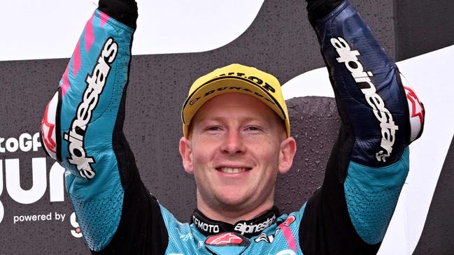 Third-placed CFMoto Racing Prustel's Australian rider Joel Kelso celebrates on the podium after competing in the Moto3 class race of the MotoGP Australian Grand Prix at Phillip Island. Photo by William West/AFP