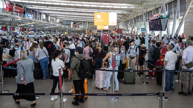 Scenes of long queues inside and outside the T2 Domestic terminal at Sydney airport at the weekend are tipped to be repeated over the Easter break. Picture: Julian Andrews