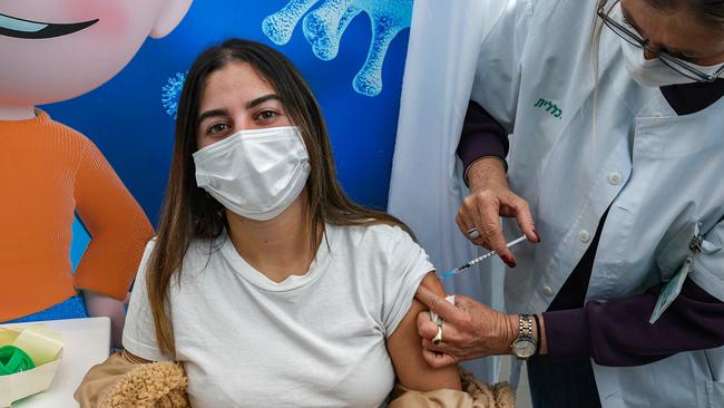 An Israeli teenager receives a dose of the Pfizer-BioNtech vaccine in Tel Aviv. Picture: AFP