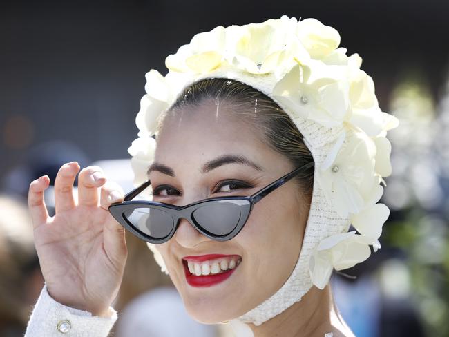 Myer Fashions On The Field contestant Angela Menz wearing a floral head piece. Picture: David Caird