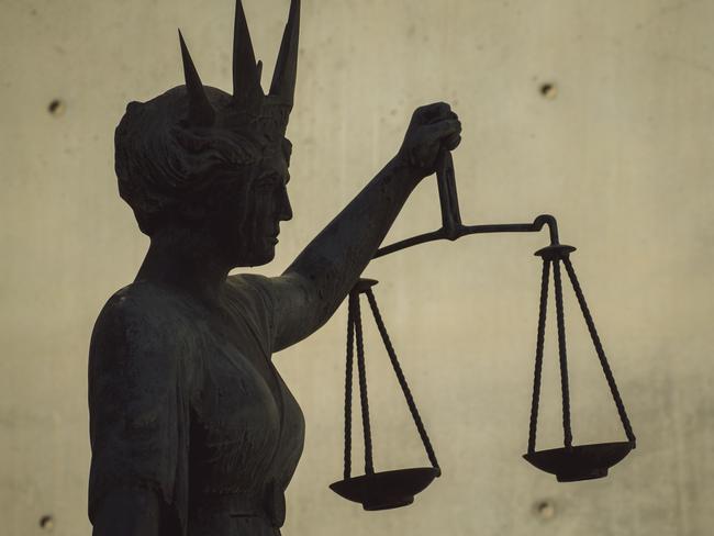 BRISBANE , AUSTRALIA - NewsWire Photos - BRISBANE , JUNE 24 2024: Generic photo of the scales of justice stature outside Brisbane Supreme Court in the Brisbane CBD. Picture: NewsWire / Glenn Campbell