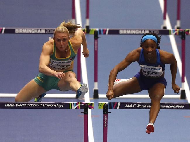 Australia's Sally Pearson (C) was beaten by US athlete Kendra Harrison (R) in her semi-final of the women's 60m hurdles at the 2018 IAAF World Indoor Athletics Championships.